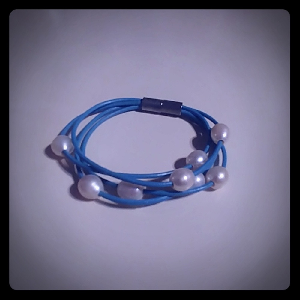 Multi-strand loose beaded blue leather bracelet